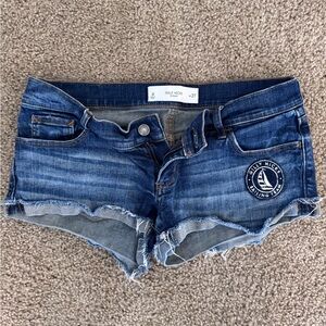 Gilly Hicks Low Rise Blue Jean Shorts with Distressed Hem